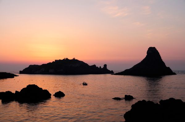 Islands of the Cyclops at Dawn Sicily Italy - Creative Commons by gnuckx