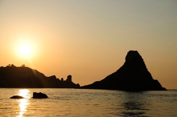 Islands of the Cyclops at Dawn Sicily Italy - Creative Commons by gnuckx