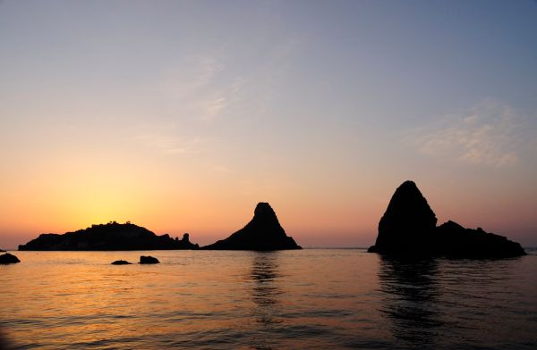 Islands of the Cyclops at Dawn Sicily Italy - Creative Commons by gnuckx