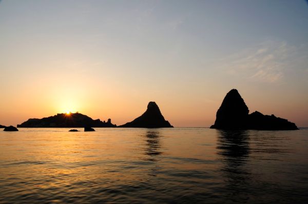 Islands of the Cyclops at Dawn Sicily Italy - Creative Commons by gnuckx