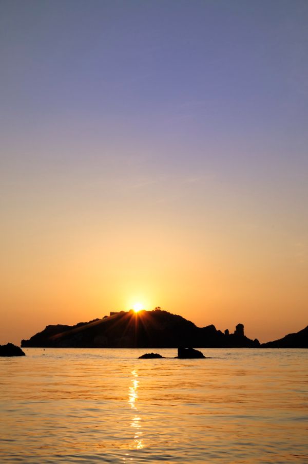 Islands of the Cyclops at Dawn Sicily Italy - Creative Commons by gnuckx