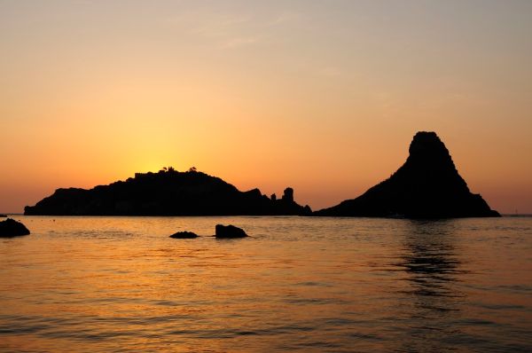Islands of the Cyclops at Dawn Sicily Italy - Creative Commons by gnuckx