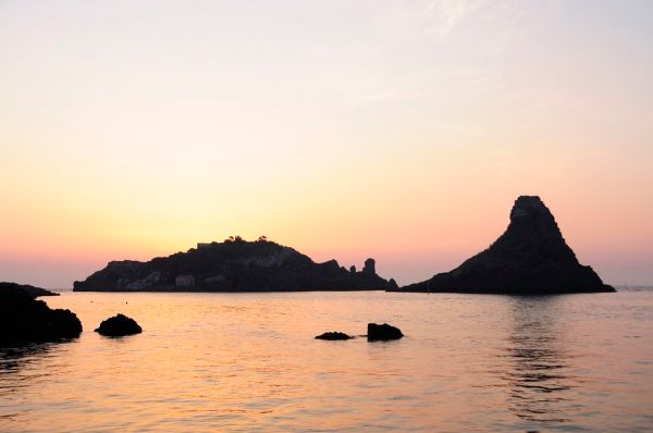 Islands of the Cyclops at Dawn Sicily Italy - Creative Commons by gnuckx