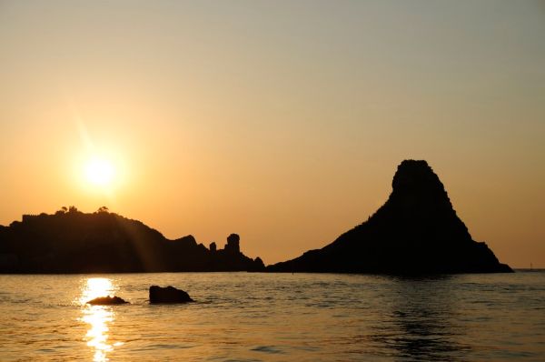 Islands of the Cyclops at Dawn Sicily Italy - Creative Commons by gnuckx