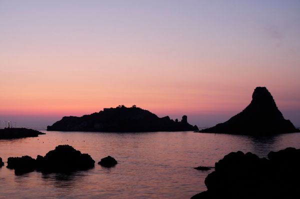 Islands of the Cyclops at Dawn Sicily Italy - Creative Commons by gnuckx
