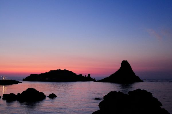Islands of the Cyclops at Dawn Sicily Italy - Creative Commons by gnuckx