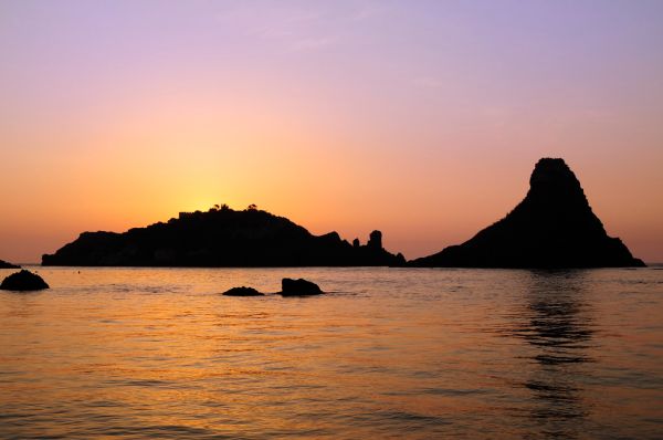 Islands of the Cyclops at Dawn Sicily Italy - Creative Commons by gnuckx